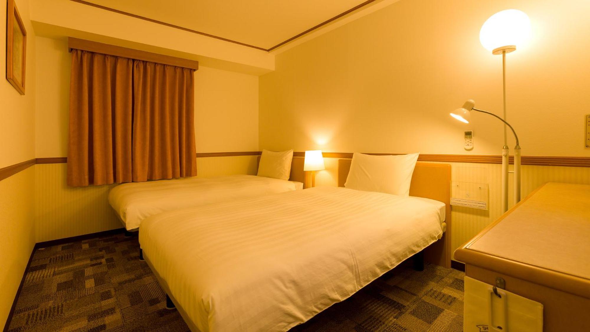 Toyoko Inn Kagoshima Chuo Eki Nishi Guchi Rum bild