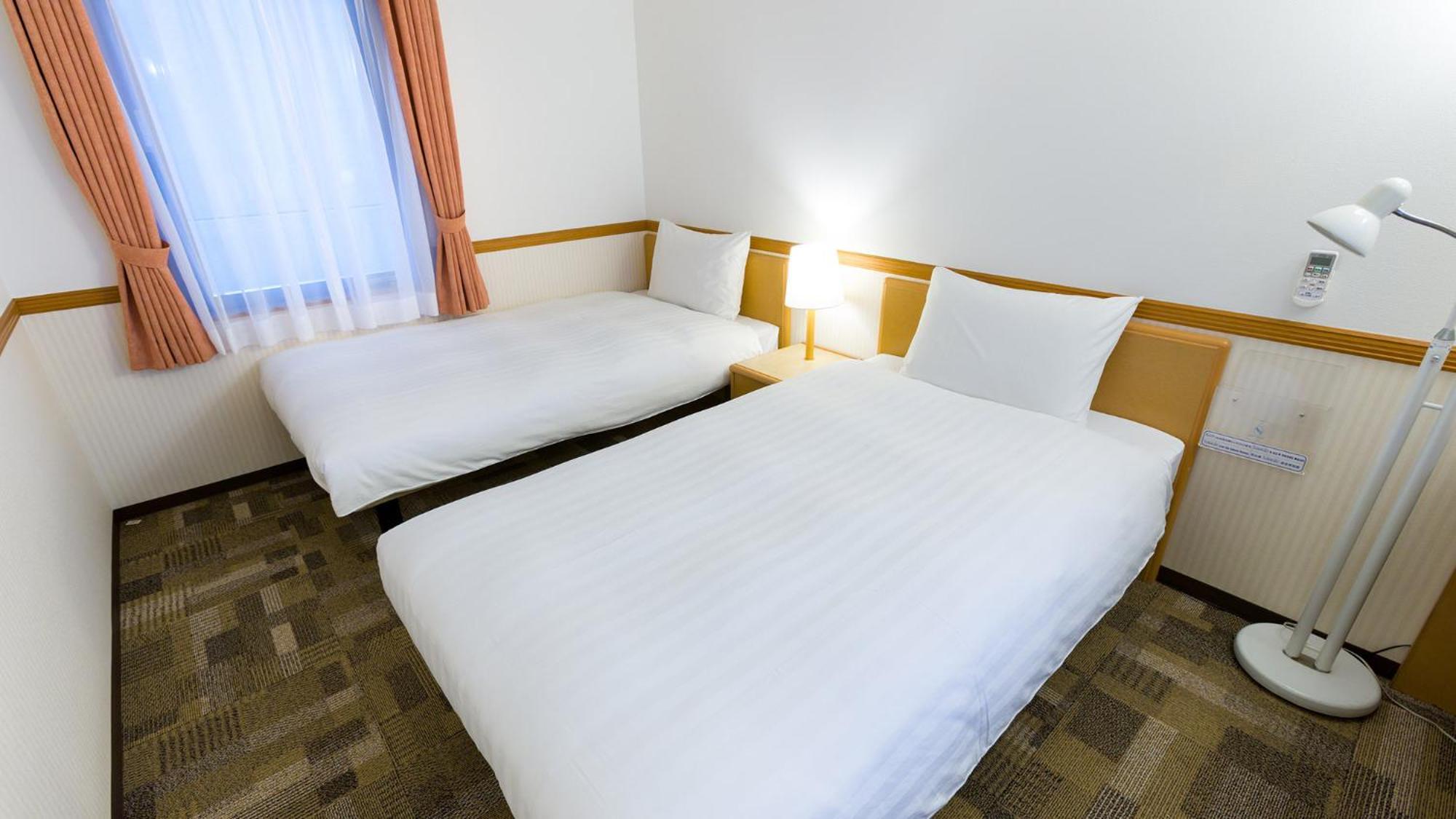 Toyoko Inn Kagoshima Chuo Eki Nishi Guchi Rum bild